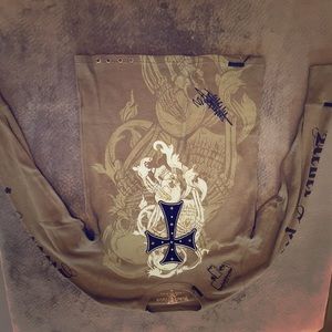 Green long sleeved Rebel Spirit shirt.